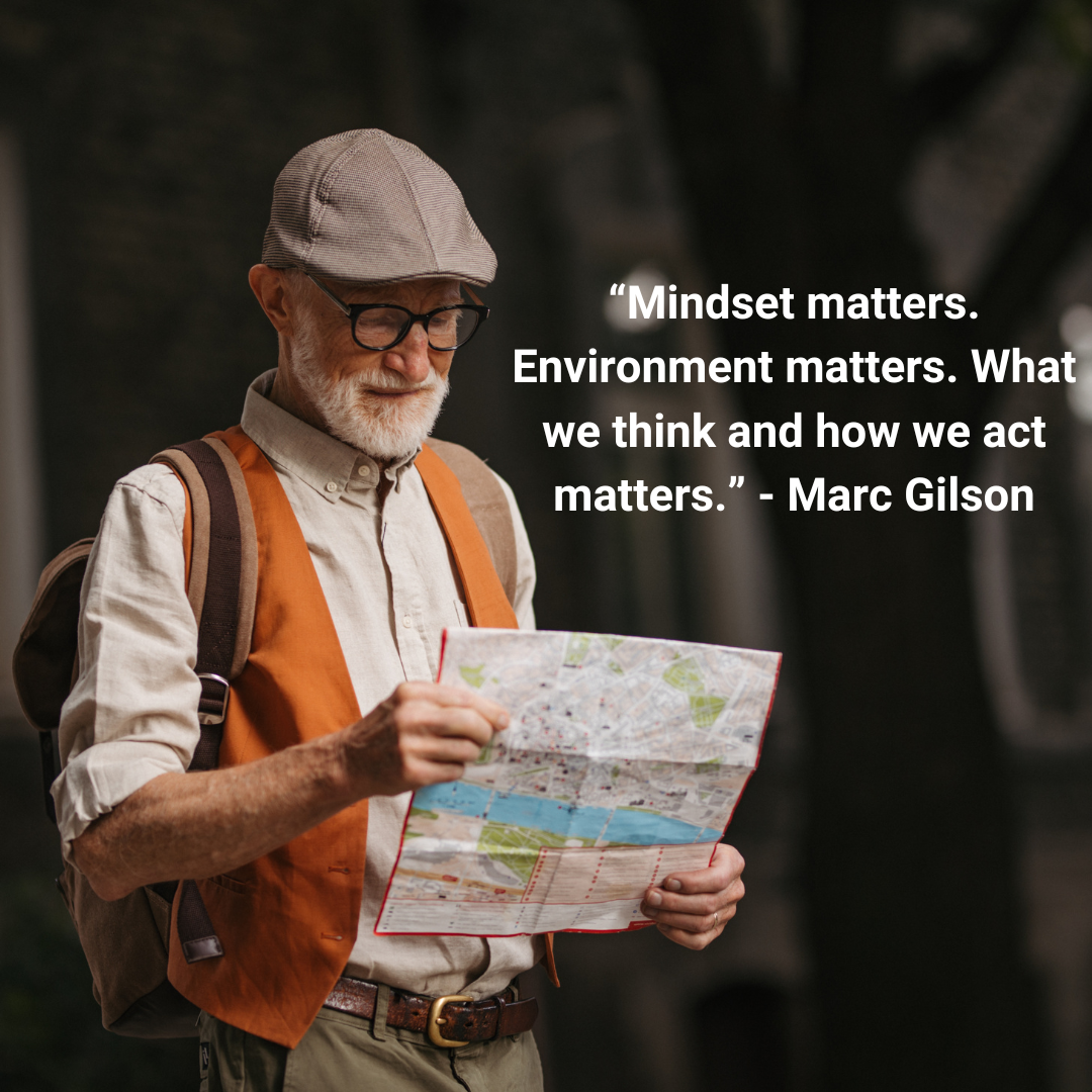 old man looking at map
