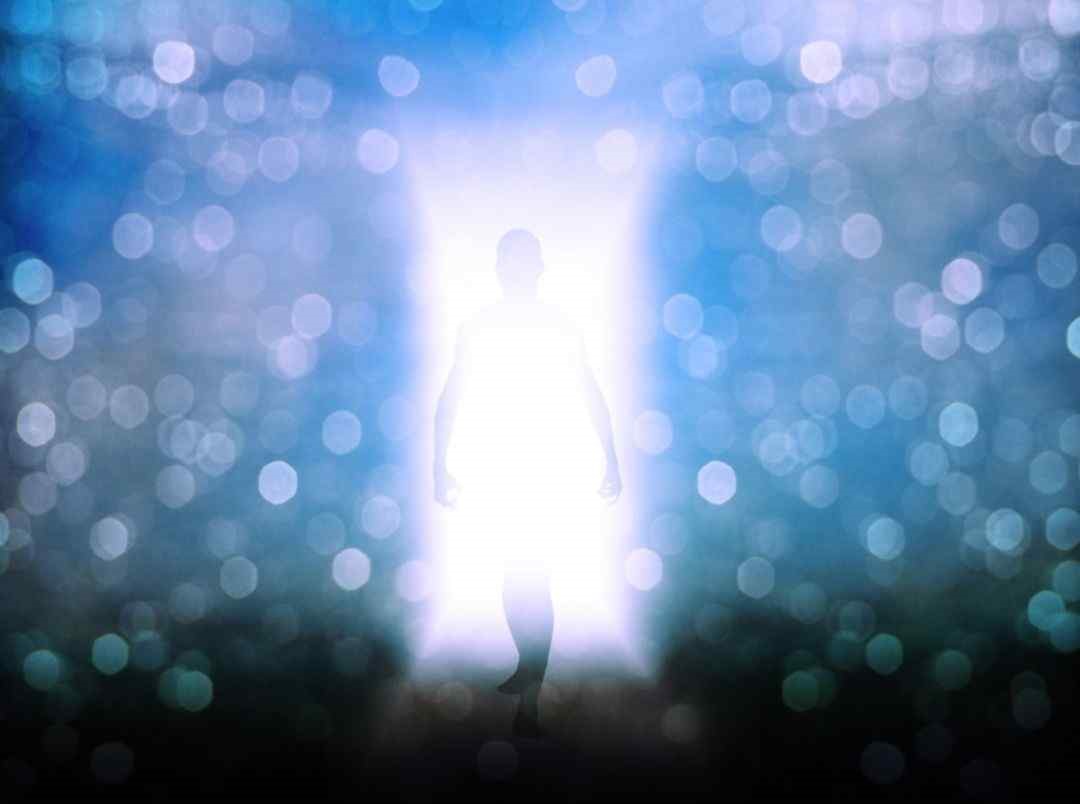 MP 412 Email Image 2 human walking through a doorway of light