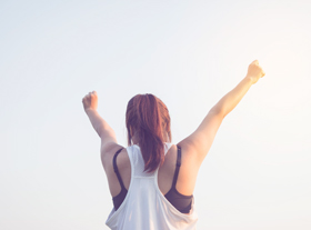 Woman with arms in the air