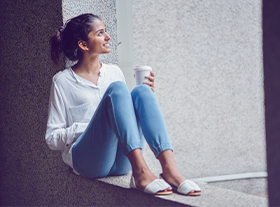 young woman drinking coffee